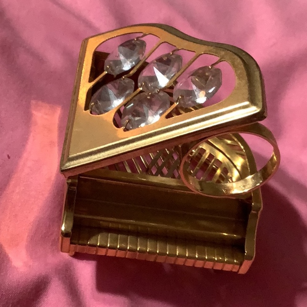 Mascot Intl Inc goldtone piano with strung crystals